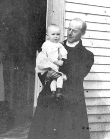 134: Fr. Savin and baby Vince McCarthy (1920)  - Vince son of James McCarthy &amp;amp; Julia Reddy